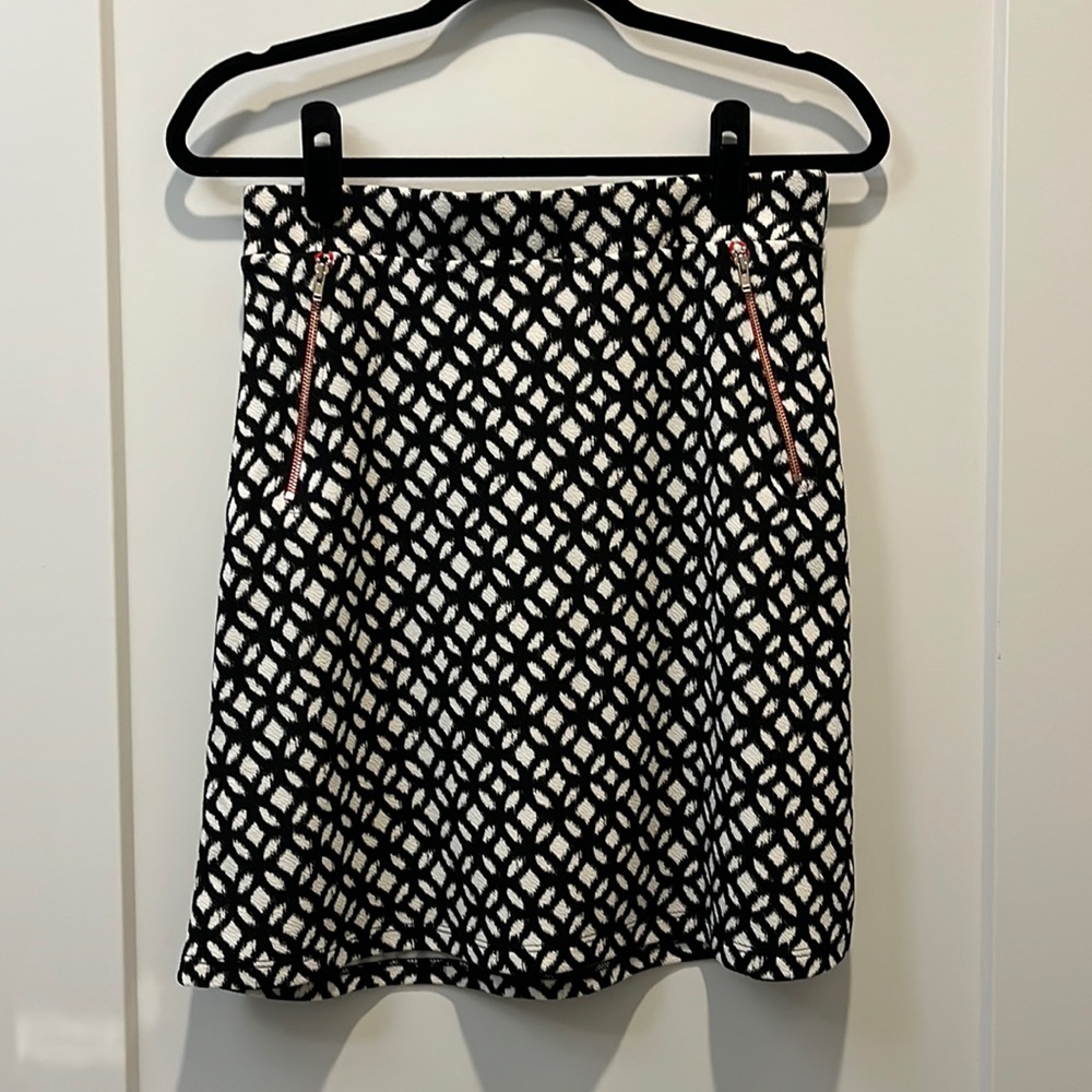 black and white patterned pencil skirt with red detail